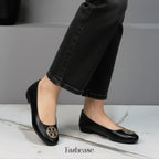 Roundie Emblem Pumps