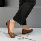 Roundie Emblem Pumps