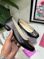 Roundie Emblem Pumps